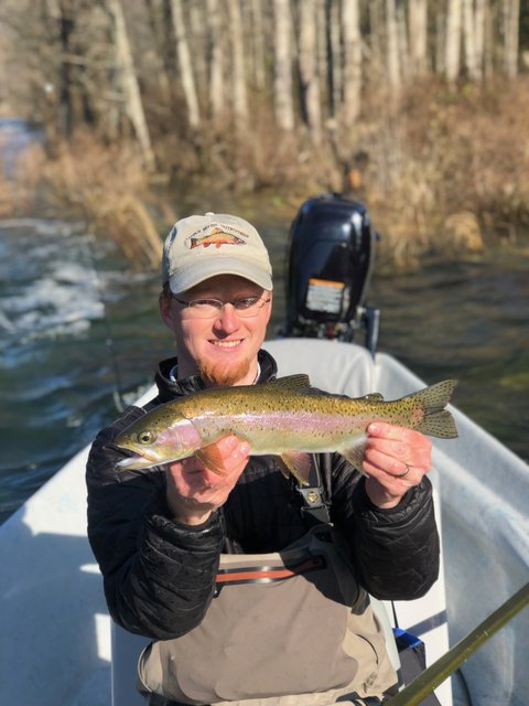 A nice rainbow trout for Clinch River fly fishing guide David Knapp in the ClackaCraft drift boat