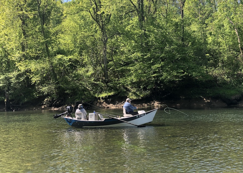 Floating with an Obey River fly fishing guide in a ClackaCraft drift boat. 