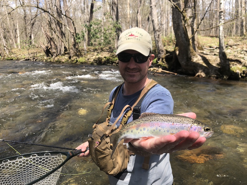 Legendary angler Nathan Stanaway with a wild Smokies rainbow caught with Great Smoky Mountains Fly Fishing Guide David Knapp in spring of 2025.