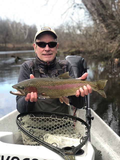Bill with a trophy rainbow trout caught while fishing the Clinch River